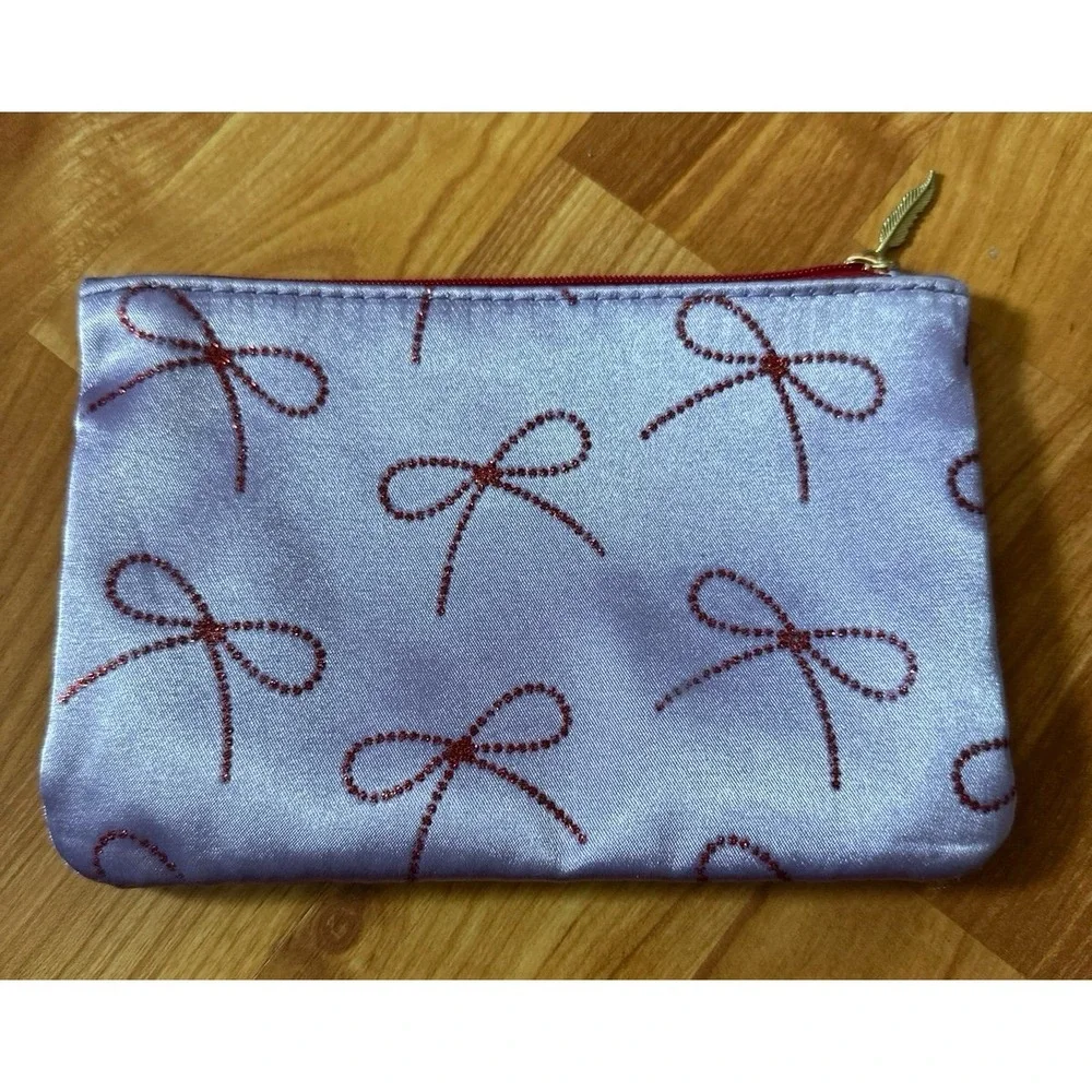 Ipsy lavender cosmetic bag from‎ the December 2025 Glam Bag collection,